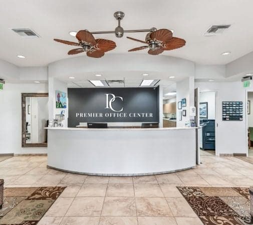 Copy of Copy of Front Lobby with Logo Front desk of the premier coffee center, featuring a sleek design and a barista ready to assist customers.